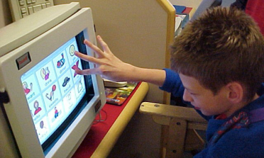 young student using ICT