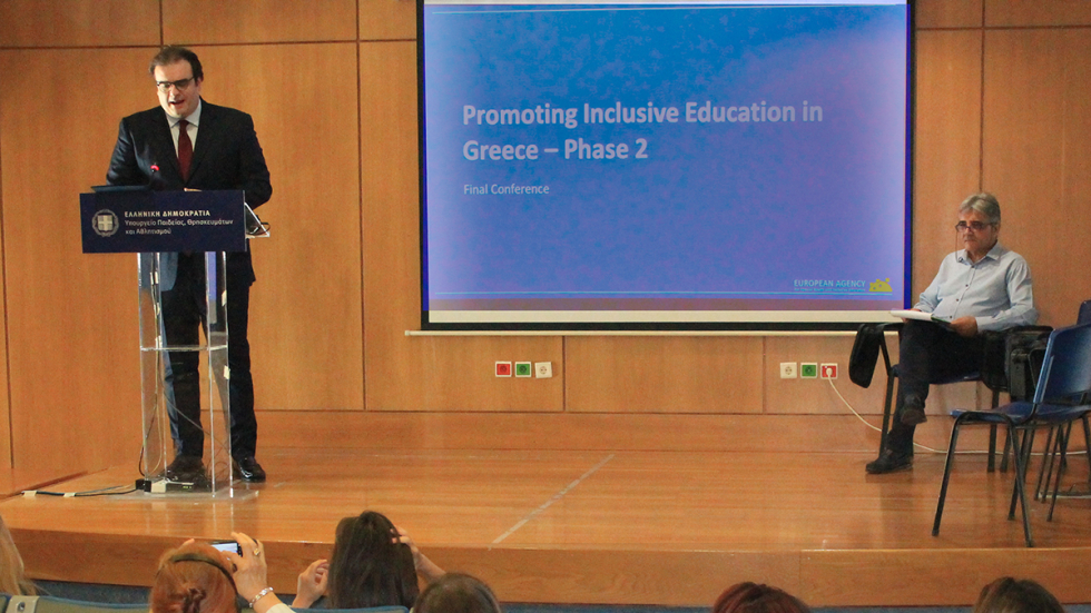 Minister of Education, Kyriakos Pierrakakis, delivers his opening speech at the conference, with Giannis Bousdounis, Director of the Department of Special Needs, seated to his right.