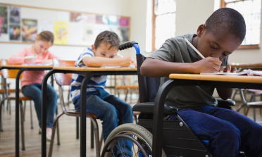 image of young people taking an exam to represent the Assessment in Inclusive Settings – Key policy messages report