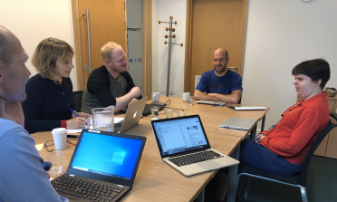 The testing group discuss the new MyAgency intranet