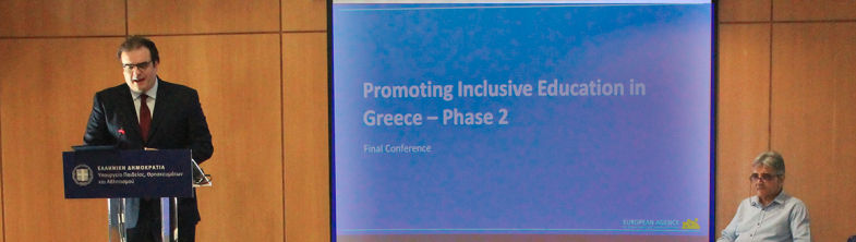 Minister of Education, Kyriakos Pierrakakis, delivers his opening speech at the conference, with Giannis Bousdounis, Director of the Department of Special Needs, seated to his right