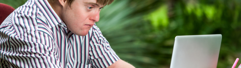 young man working at a computer